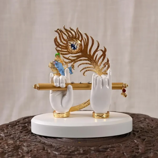 White & Golden Polyresin Gold Plated Krishna Hand With Face, Flute And Peacock Feather