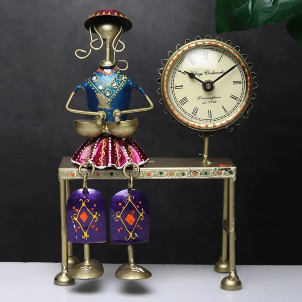 Decorative Sitting Doll With Clock In Metal
