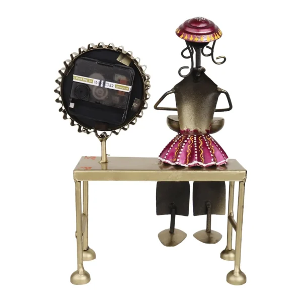 Decorative Sitting Doll With Clock In Metal