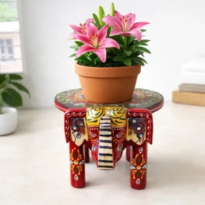red wooden elephant stool for plant stand decor